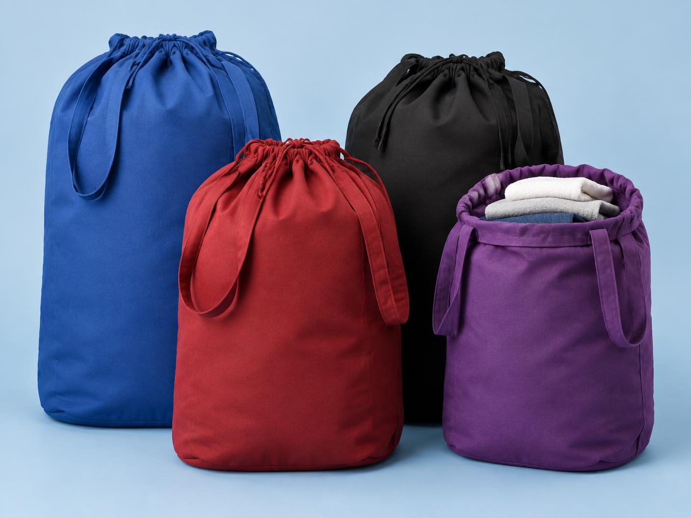 Blue, red, black, and purple fabric drawstring laundry bags